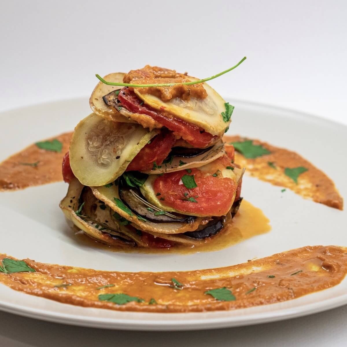 gastronomic ratatouille on a white plate